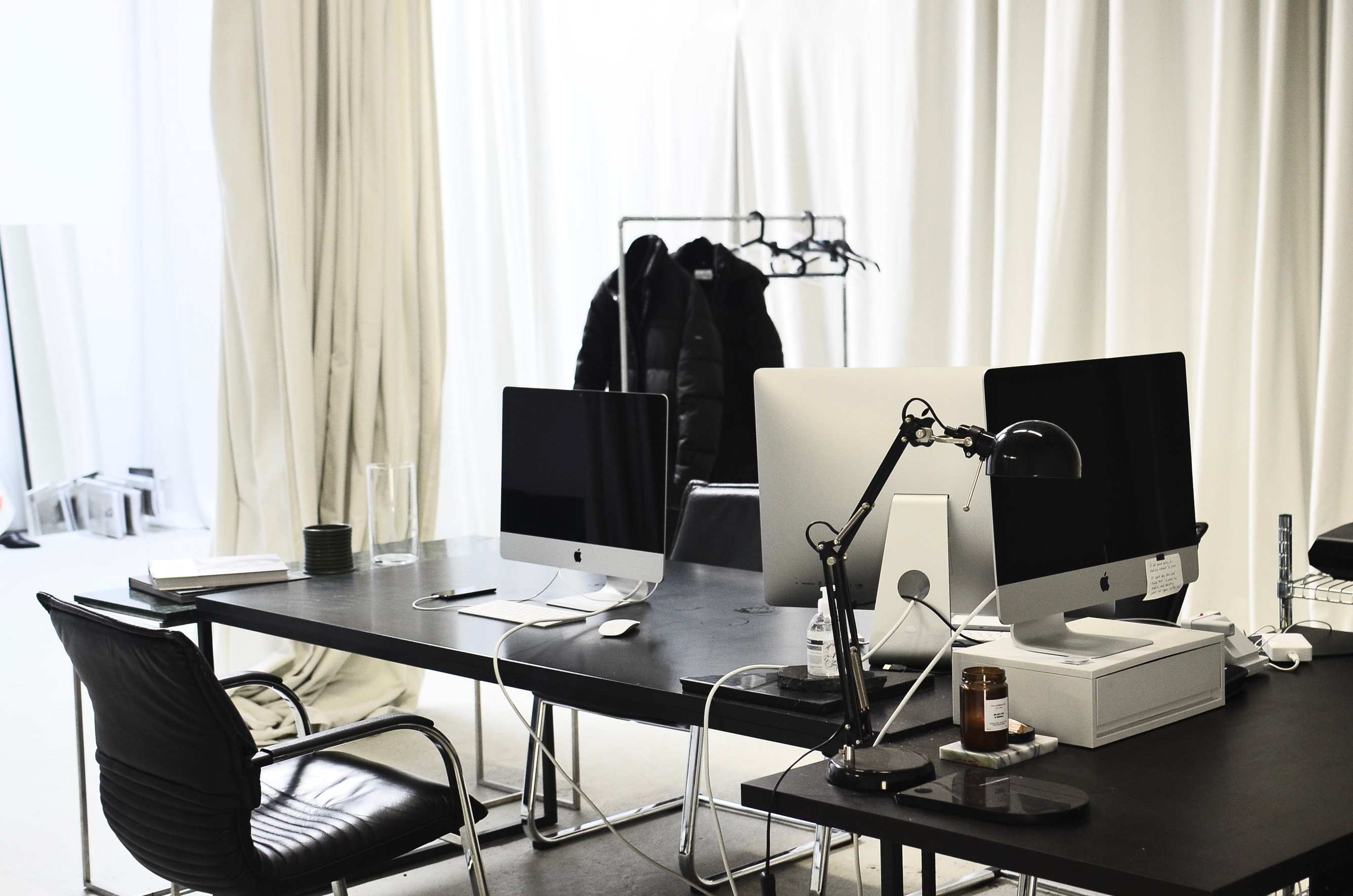 Wide view of an office workspace with computers, contemporary empty office with modern computers